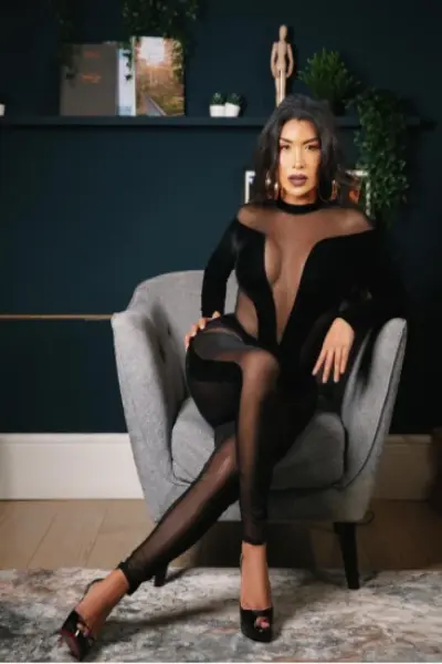 Colombian TS Escort in a black outfit