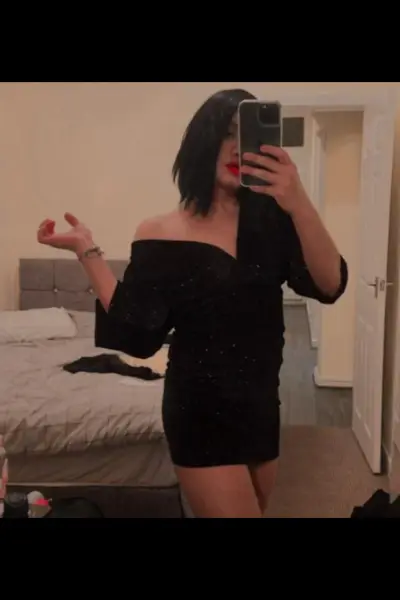 TS escort taking a selfie