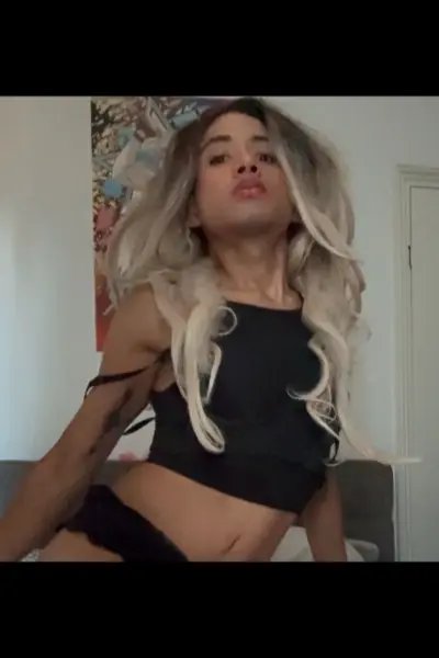 TV escort in a blonde wig