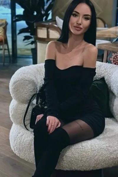 Guildford Escort in a black dress