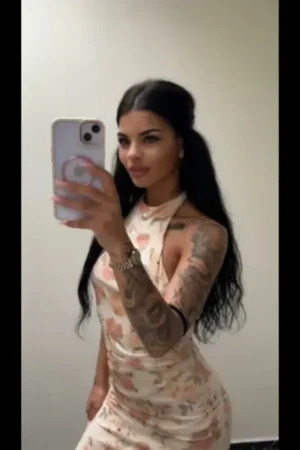 Tattooed Inverness escort taking a selfie