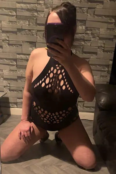 Birmingham Escort in black underwear taking a selfie