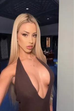 Blonde London escort in revealing clothing