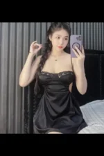 Nuru Massage escort in a silky black dress